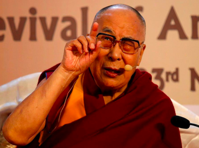 FILE PHOTO: Tibetan spiritual leader, the Dalai Lama, speaks at an interactive session organised by Indian Chamber of Commerce on “Revival of Ancient Knowledge” in Kolkata, India, November 23, 2017. REUTERS/Rupak De Chowdhuri/File photo